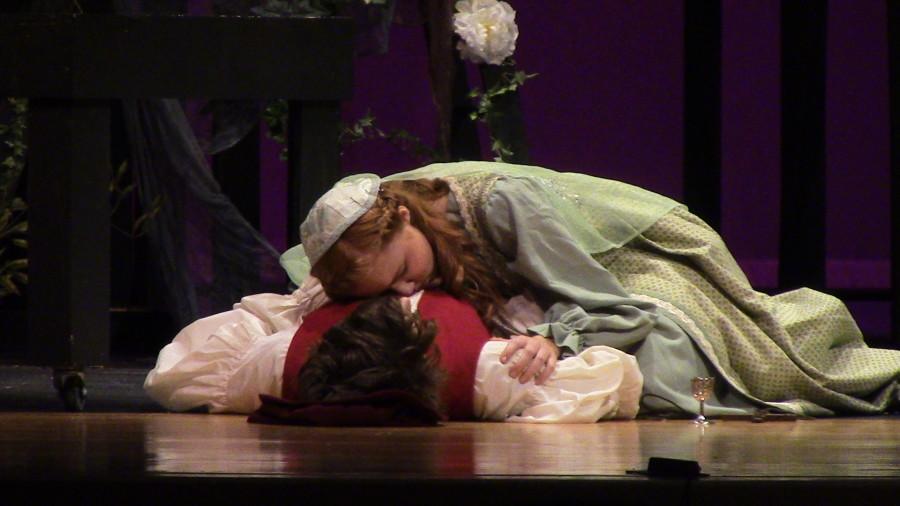 Actors Cade Owens and Carly Suhr perform their final scene, the death of Romeo and Juliet.