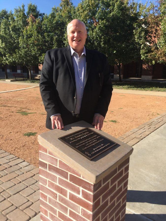 Mr. Randy Spain is honored as the founding principal of Centennial H.S. with a plaque in the courtyard. 