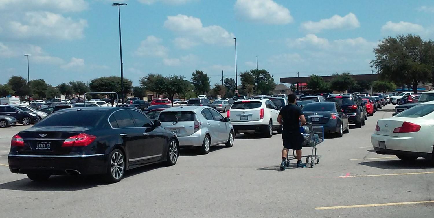 Drivers in line at Sams Club gas station in Plano. 