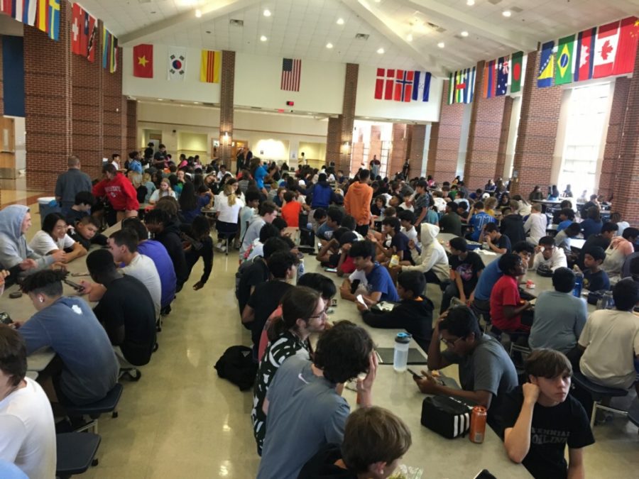 Centennial+High+School+students+sitting+and+eating+in+a+crowded+cafeteria