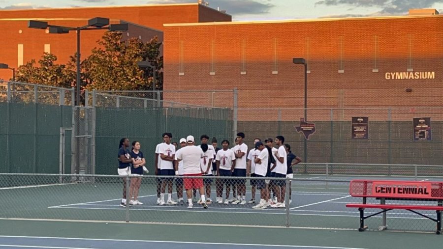 Centennial Titan Tennis Team Players Gathering for a Team Meeting