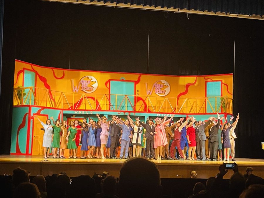 The actors bowing together at the end of the musical