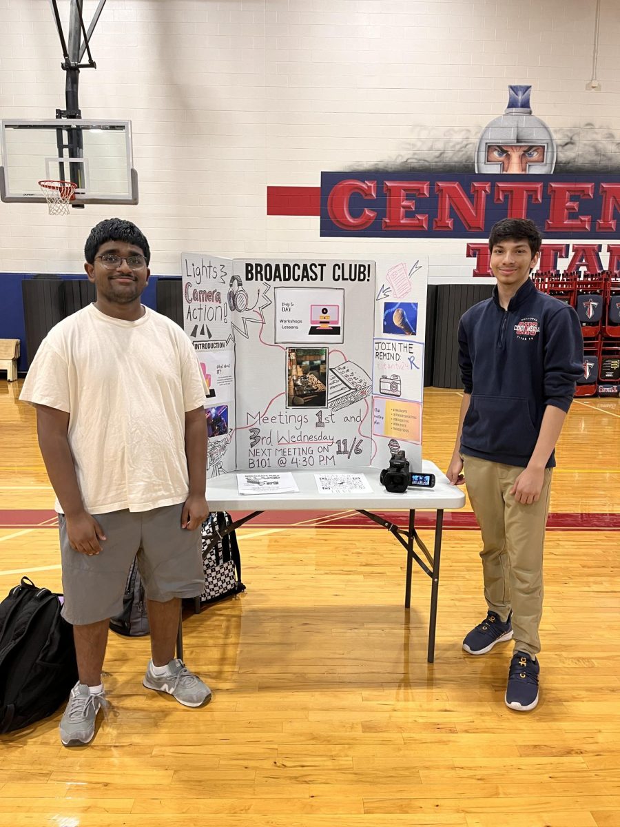 Caption: Prasanna Bendalam, president of the broadcast club (left), and Dhruv Gurumukhi, vice president of the Broadcast club (right), standing in front of their booth at Centennial's annual club fair.