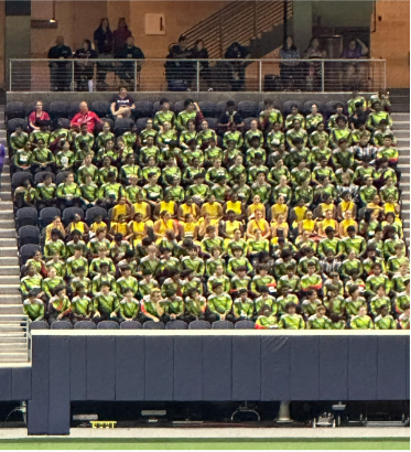 The Titan Band watching other schools at the FISD Marching Band Showcase. 

