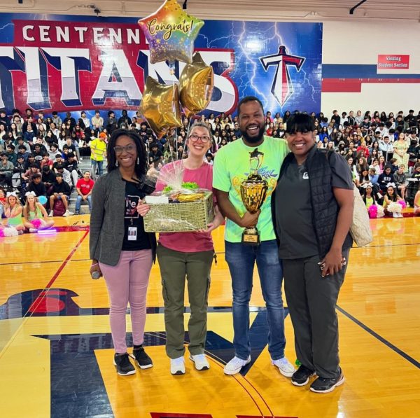 Mr. Moore receiving the Teacher of the Year award at the Nov. 7 pep rally.