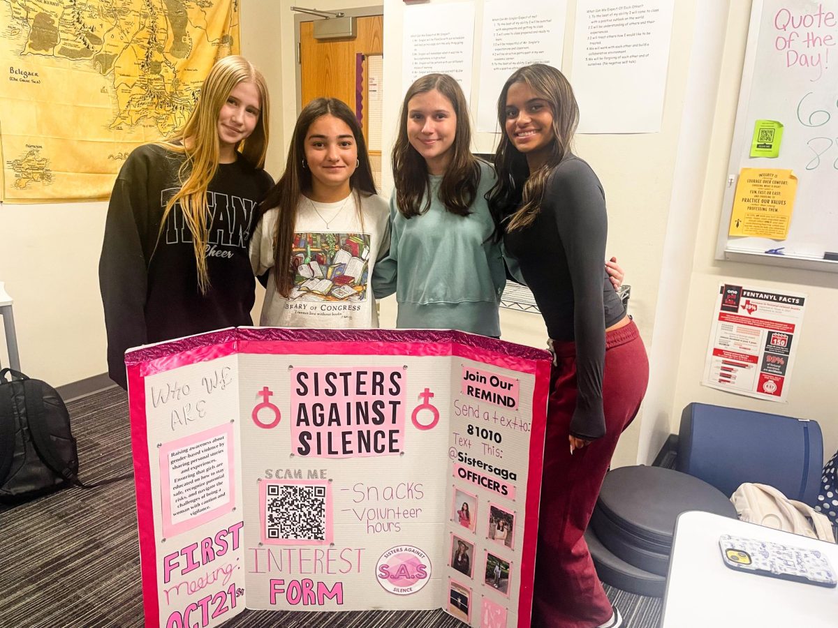 Sisters Against Silence club officers Emily Belaigorod, Leena El-Nachar, Audrey Ferriss, and Gabriela Martinez (left to right).