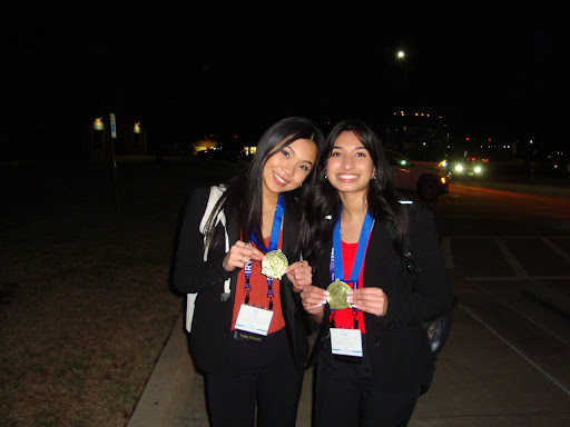 Jamie Lee (left) and Insiya Juzer (right) with their gold medals at the Jan. 13th DECA competition.