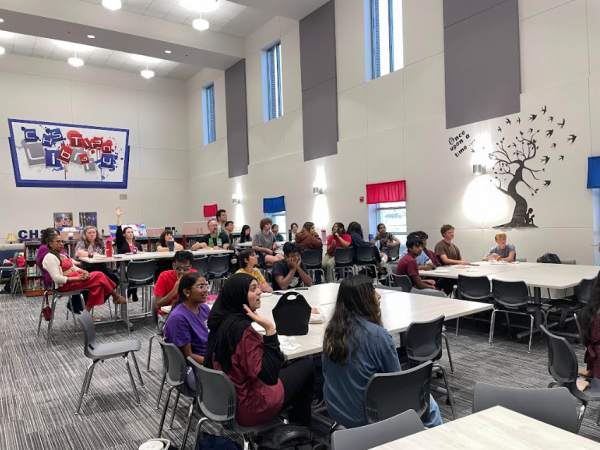 Staff versus students in a game of jeopardy.