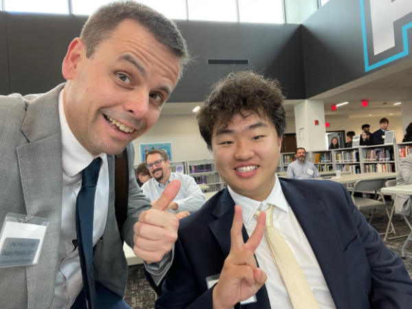 Dr. Parrish (left) and Hajoon "HJ" Yun (right) posing for a selfie as HJ waits to conduct an interview