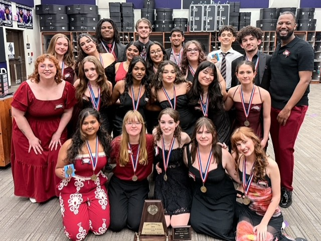 The 2026 UIL cast posing at Bi-Districts with their medals and trophy, along with their teachers Ms. Warner (left) and Mr. Moore (right).